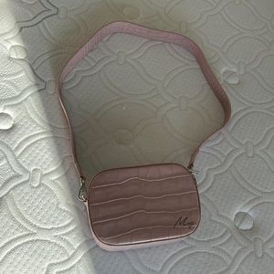 Pink leather camera bag